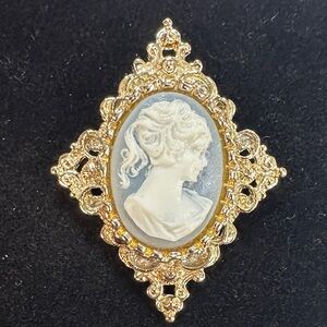 246- Vintage Gerry's signed gold-tone lady ivory blue cameo brooch. 2 x 2 1/2